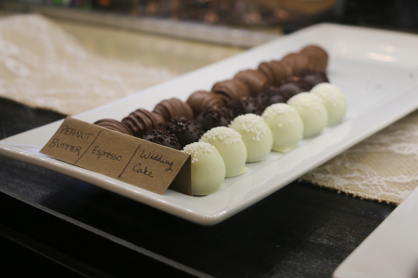 chocolates sitting on a plate