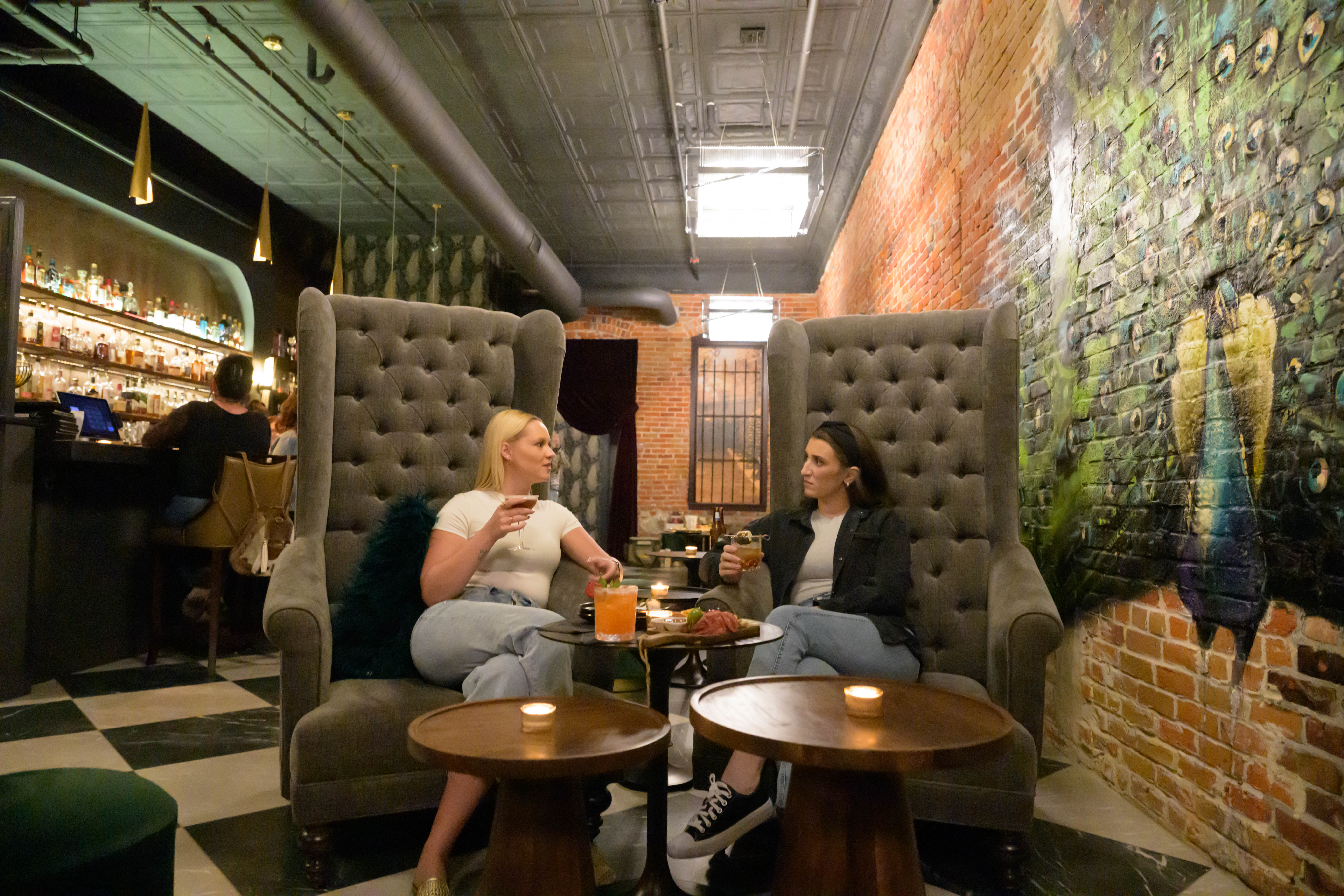 two women sitting in henry j's