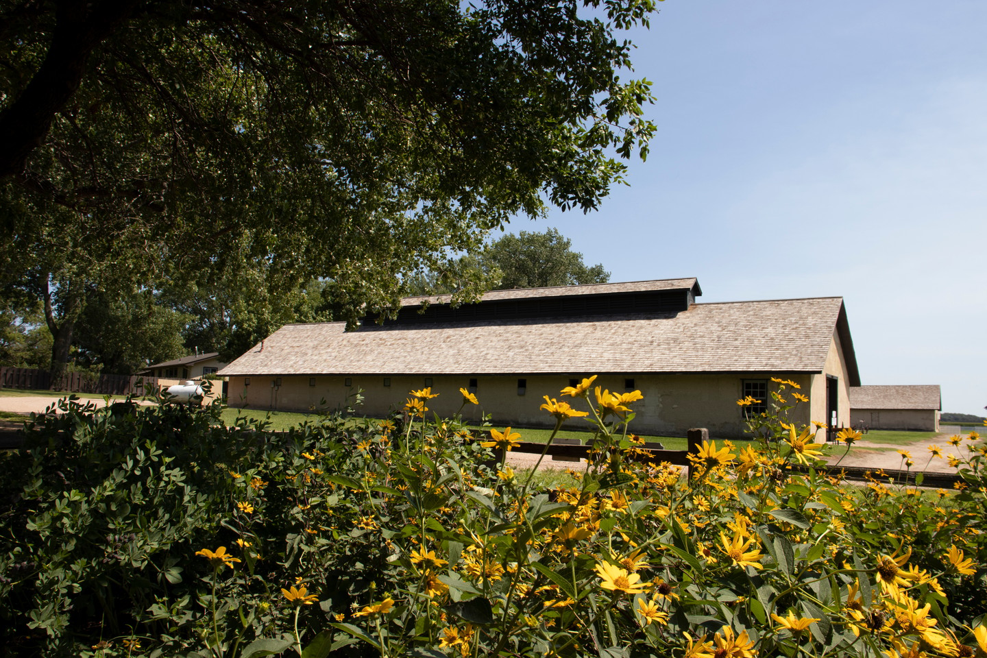 Flowers in front of a building at Fort Hartsuff State Historical Park.