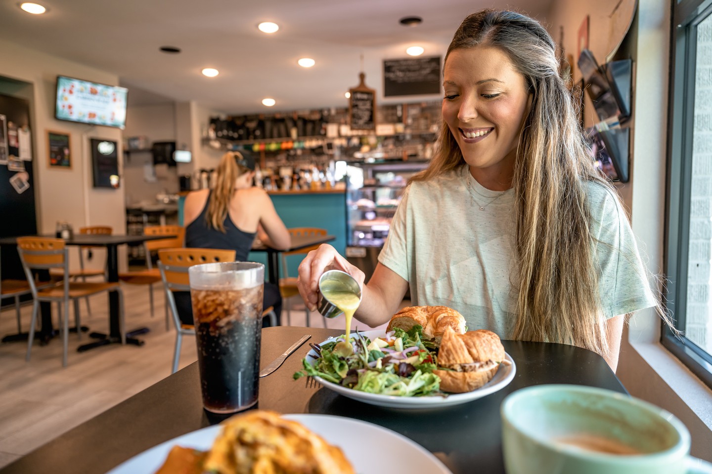 A woman enjoys a meal at The Mixing Bowl in Gering.