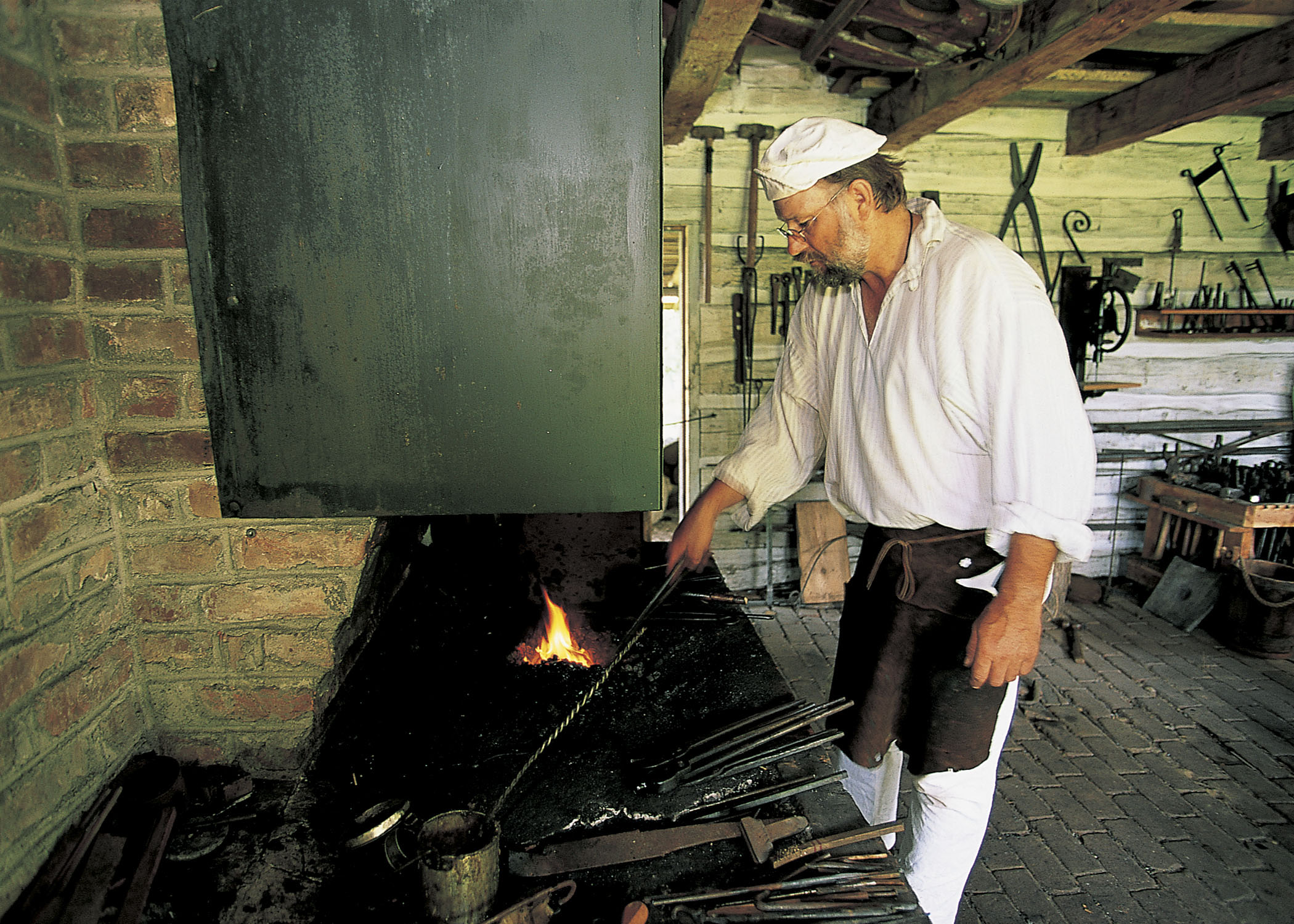 A living historian demonstrates smithing at Fort Atkinson State Historical Park in Fort Calhoun.