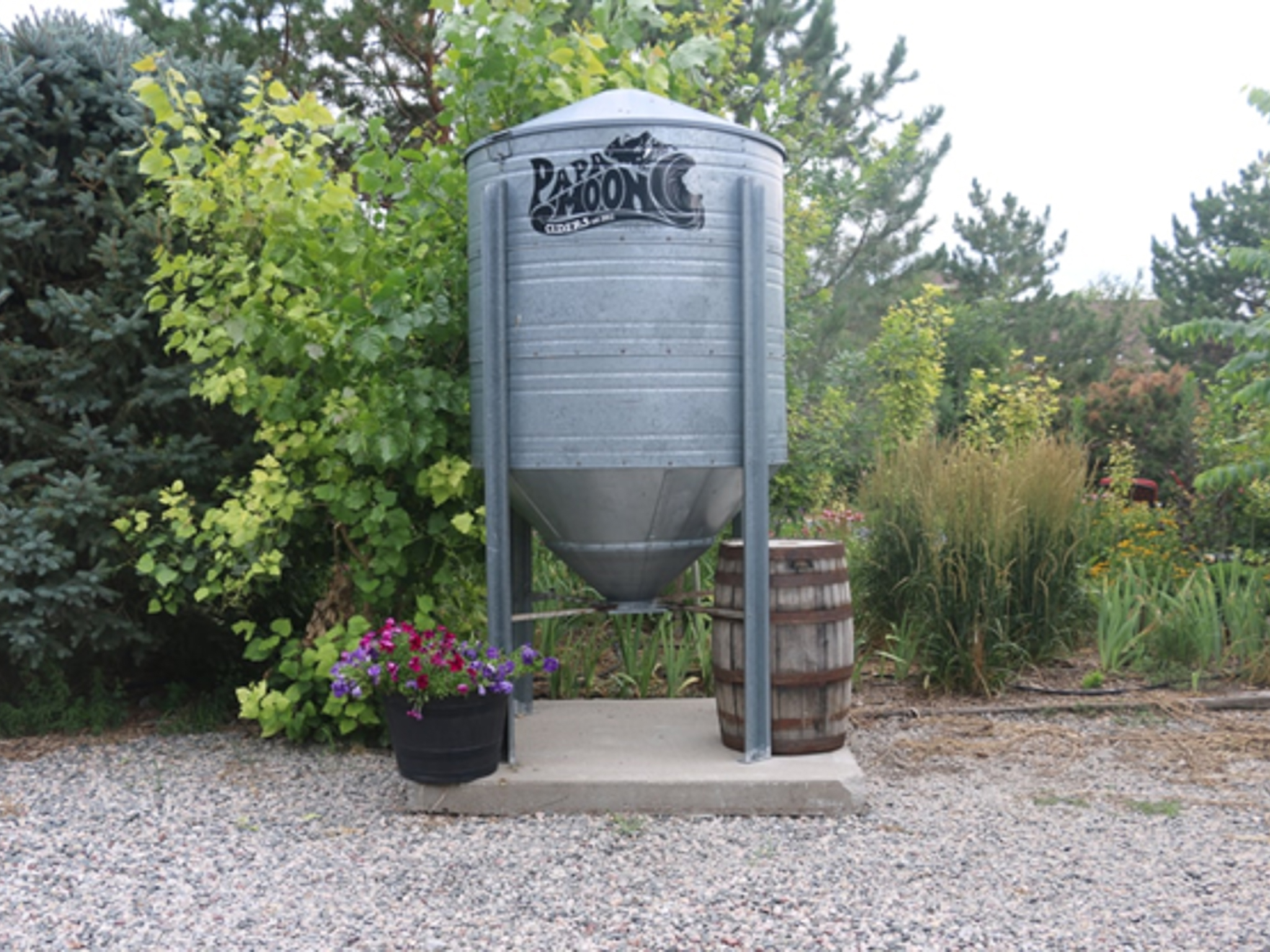 Galvanized tank with the Papa Moon logo on it. 