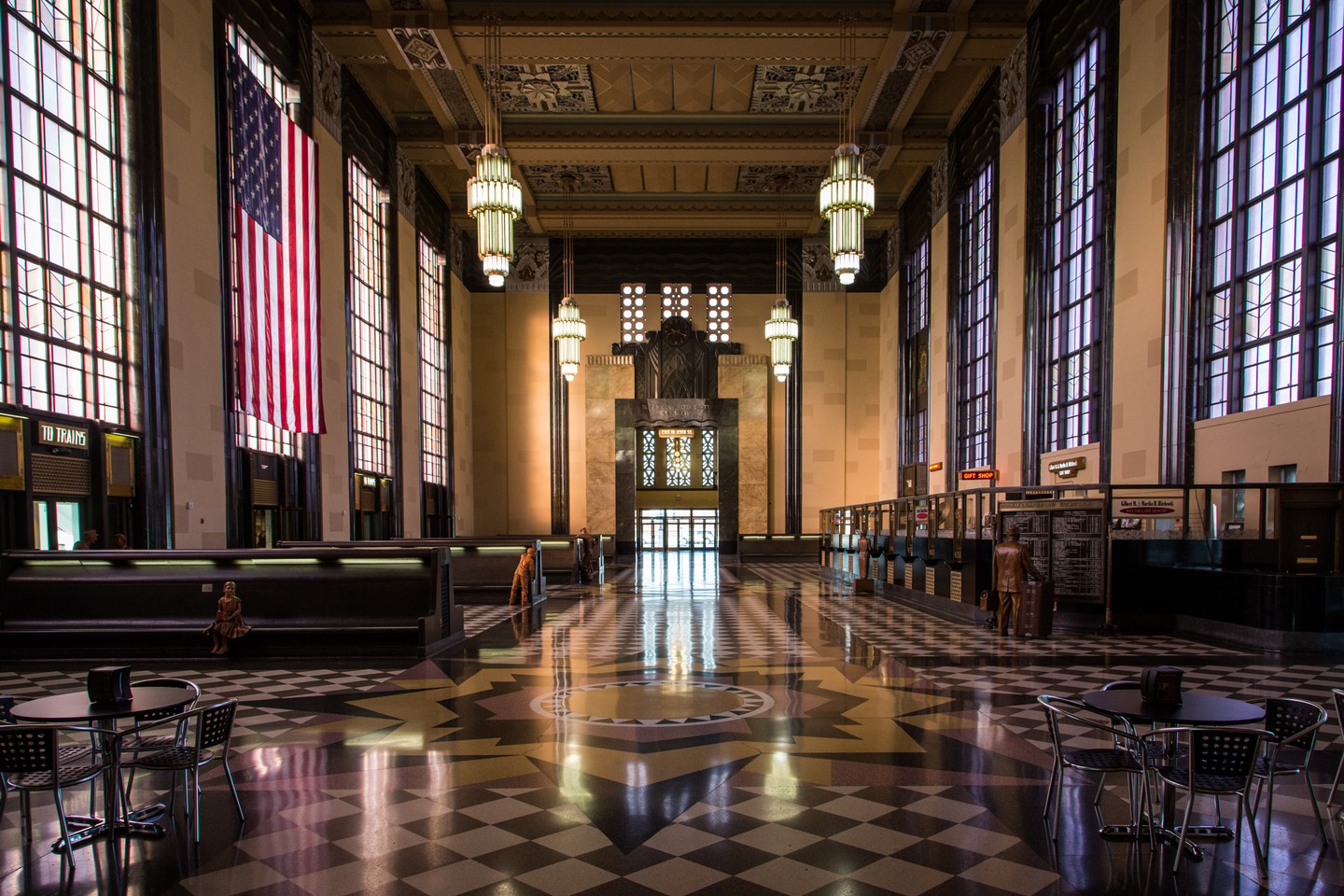 Bronze statues inside Union Station at The Durham Museum.