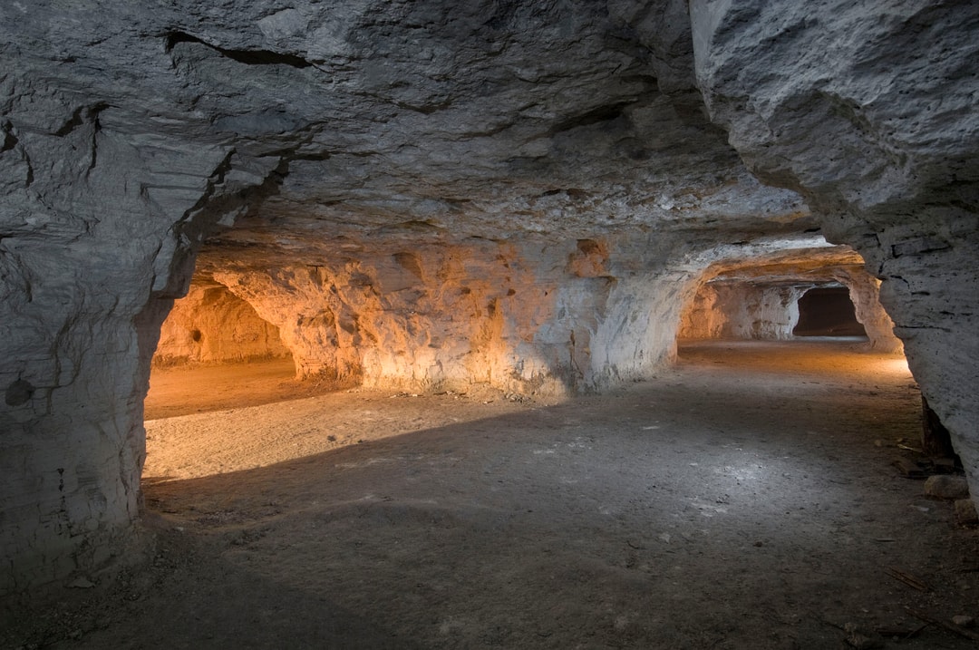 Warm lighting shows off the cavernous interior of the Happy Jack Peak and Chalk Mine in Scotia, Nebraska.