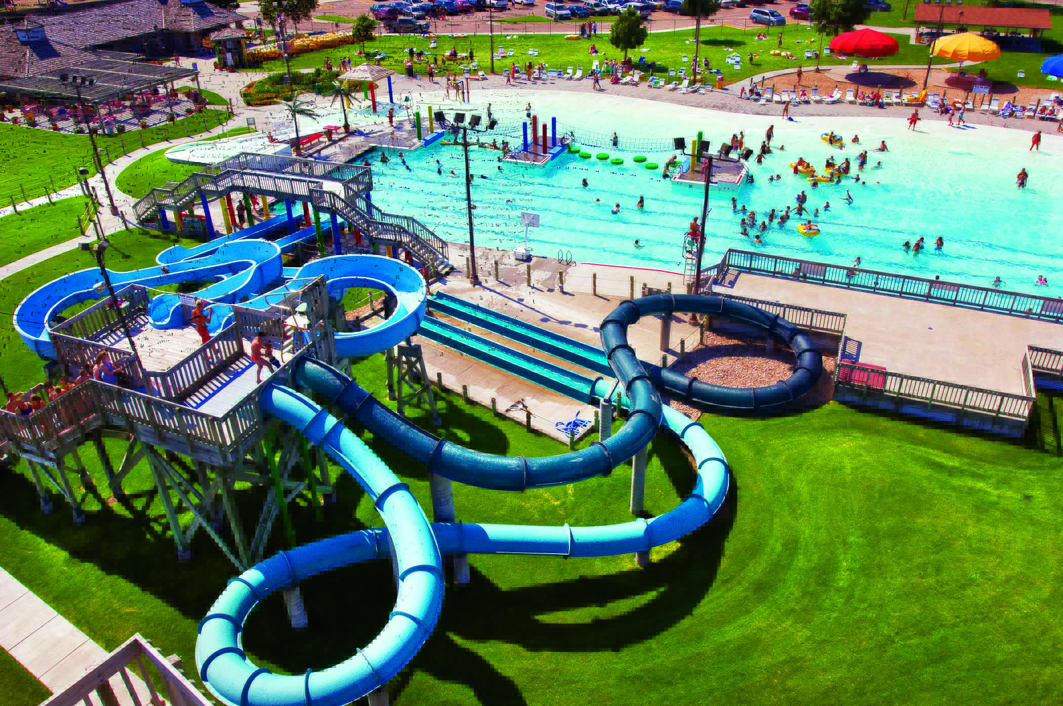 An aerial view shows people sliding down water tubes and swimming in a large pool at Island Oasis Waterpark in Grand Island in Grand Island, Nebraska.