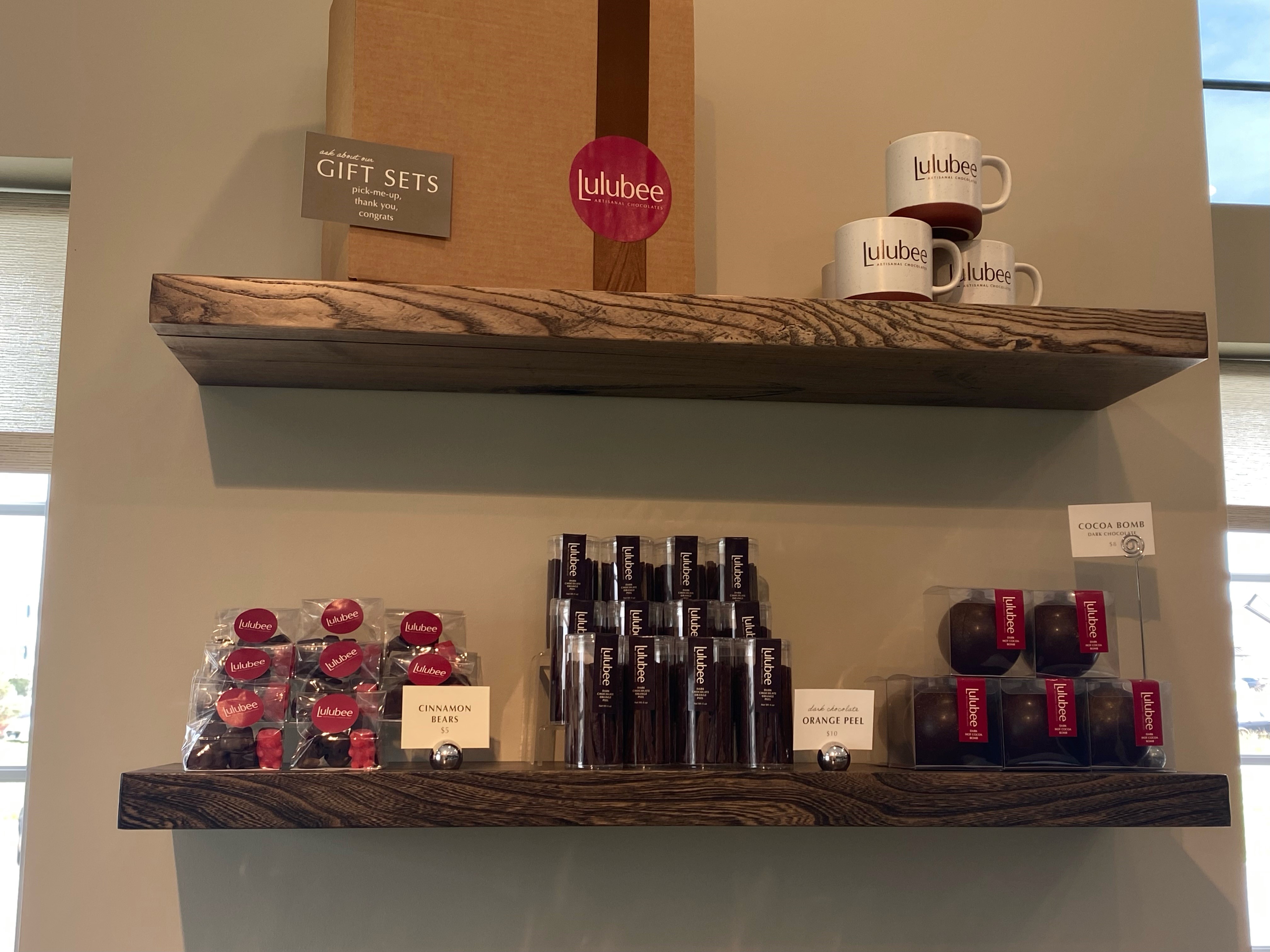 Shelves of chocolate and gifts from Lulubee Artisanal Chocolates in Lincoln.