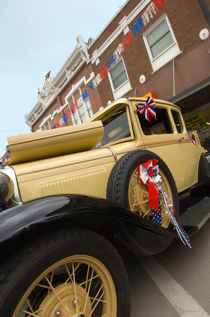A classic car decorated in red, white and blue for the Seward 4th of July Celebration. 