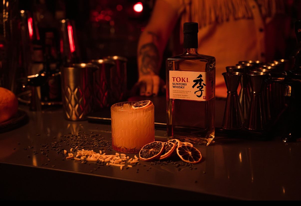 A cocktail and a bottle of Toki Suntory Whisky at Anna's Place in Omaha.