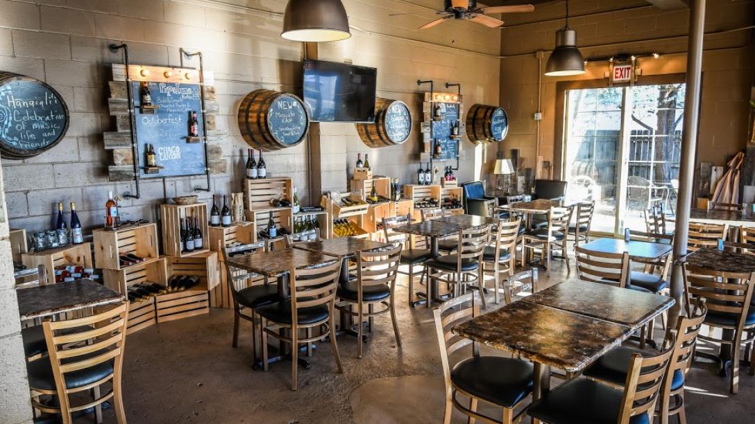 Tables and chairs set up inside The Tangled Tumbleweed.