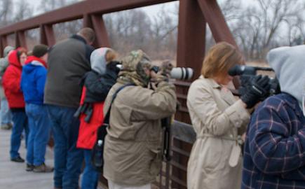 Birdwatchers gathered on Kearney Bridge for the sandhill crane migration.