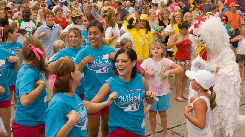 A crowd doing the Chicken Dance at the Wayne Chicken Show.