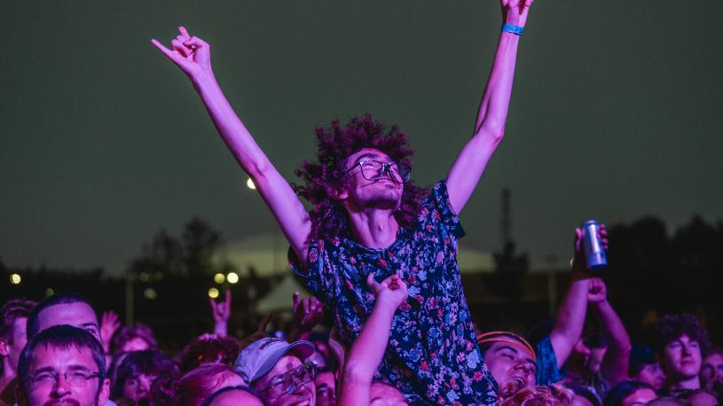 Festivalgoers crowding the stage at Maha Music Festival.